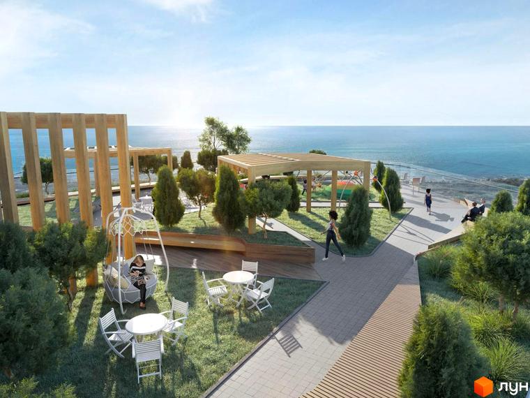 Тераса на даху Unity Towers з дерев'яними перголами та скляною огорожею, що виходить на море. Облаштовані зони відпочинку та зелені насадження.