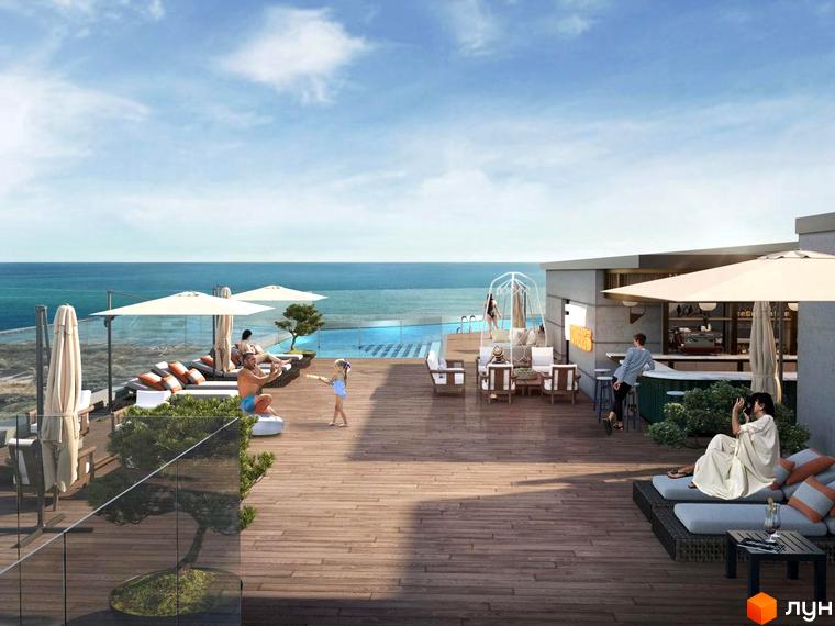 Зображення тераси на даху з басейном у Unity Towers. Вид на море, лежаки, парасольки та бар.