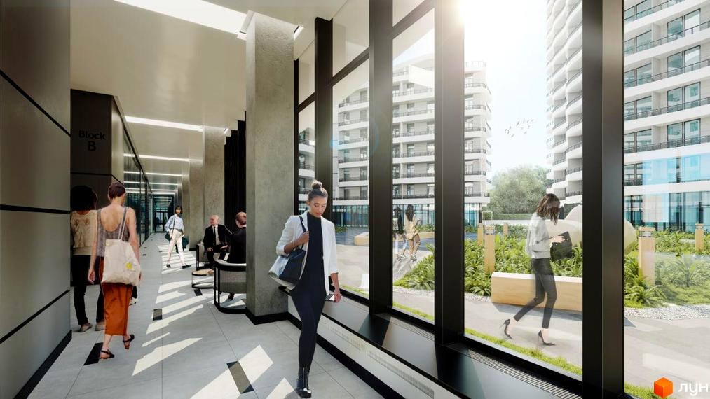 Житловий комплекс Unity Towers: високі білі будівлі з балконами та зеленою прибудинковою територією.