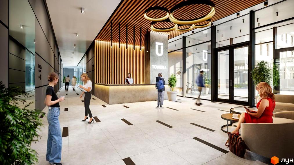 Інтер'єр лобі Житлового комплексу Unity Towers з ресепшеном та зоною відпочинку. На підлозі плитка, на стелі дерев'яні рейки та круглі світильники.