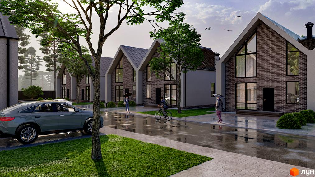 Зовнішній вигляд будинків котеджного містечка КМ PRO hygge з цегляним фасадом та великими вікнами. Прибудинкова територія з доглянутим газоном та деревами.