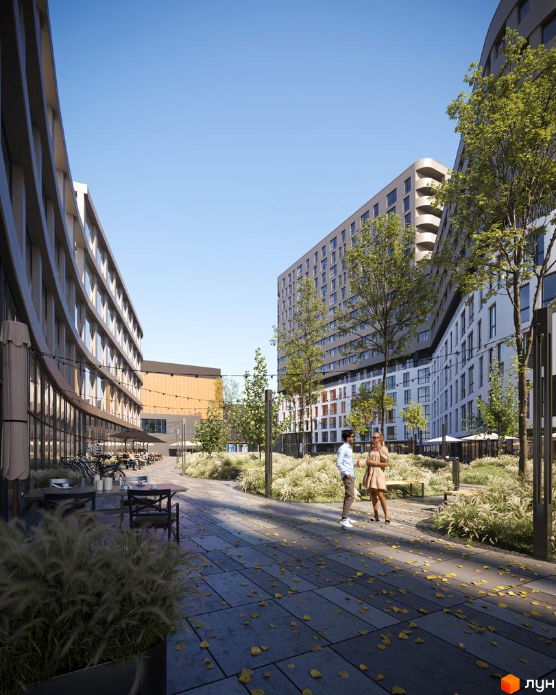 Житловий комплекс Safe Town з вигнутими фасадами та зеленою прибудинковою територією. На території розташовані зони відпочинку та пішохідні доріжки.