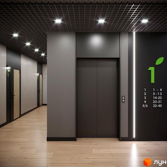 Коридор в ЖК O'Club з ліфтом та дверима. На стіні інформація про поверхи та номери квартир. Світле дерев'яне покриття підлоги.