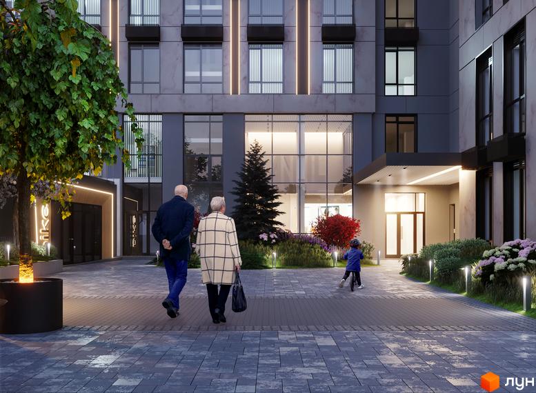 Фасад будівлі ЖК ANRIL house з великими вікнами та вхідною групою. На території комплексу висаджені дерева та кущі, облаштовані доріжки для прогулянок.