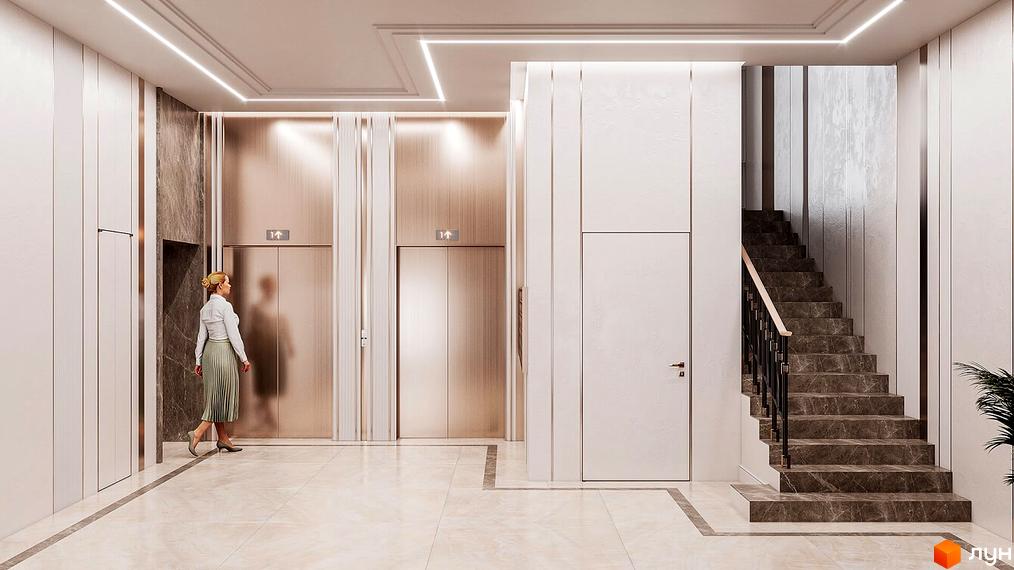 Інтер'єр лобі клубного будинку LA MANCHE з ліфтами та сходами. Оздоблення виконано в світлих тонах з використанням мармуру та металевих елементів.