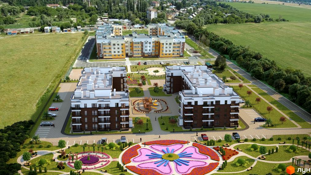 Багатоповерхові будинки Житлового комплексу Саме Той з білими, коричневими та жовтими фасадами. Прибудинкова територія має дитячі майданчики та великі квіткові клумби.