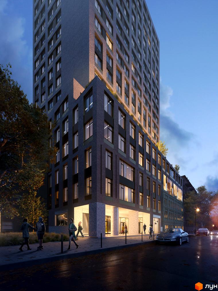 Franklin Concept House - це новобудова з цегляним фасадом та великими вікнами, розташована на вулиці з деревами та освітленою дорогою.
