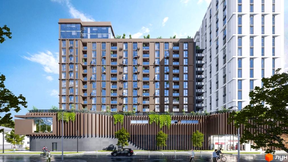 Апарт-комплекс Capital Tower з фасадами коричневого та білого кольорів, з вікнами та балконами. Навколо будинку дорога та зелені насадження.