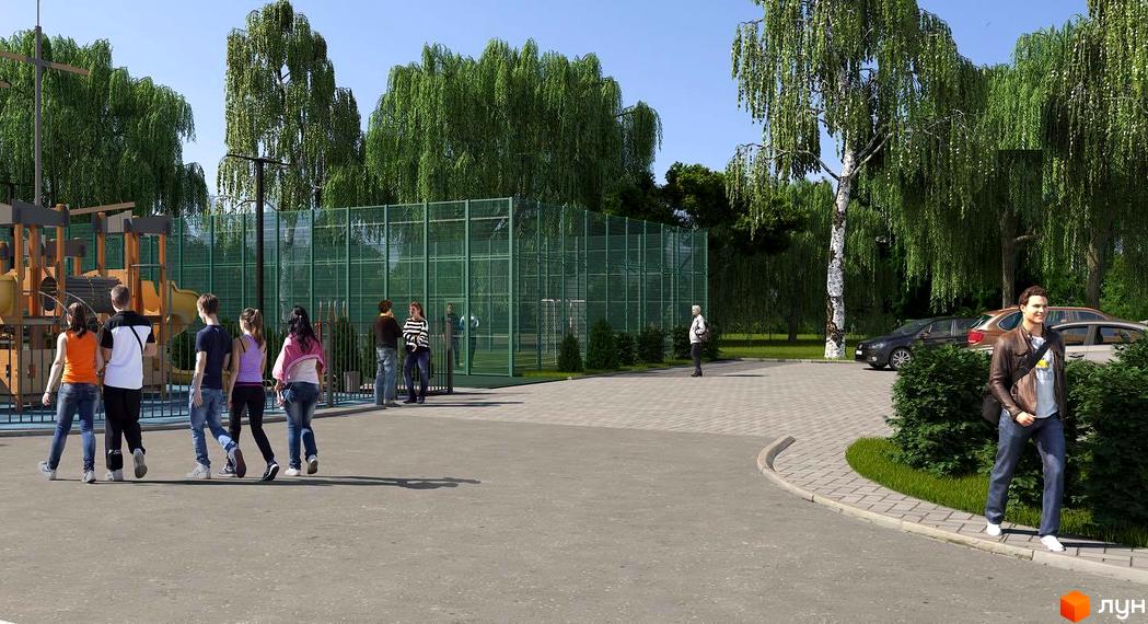 Прибудинкова територія Таунхауси DREAM HOUSE з дитячим майданчиком, огородженим спортивним полем та доглянутими зеленими насадженнями.