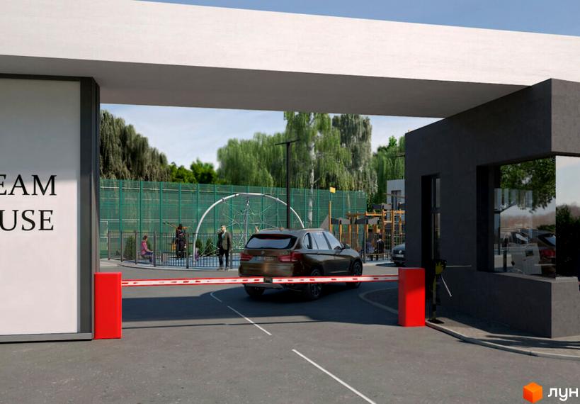 Таунхауси DREAM HOUSE, в'їзд на територію комплексу через шлагбаум. На території дитячий майданчик та зелені насадження.