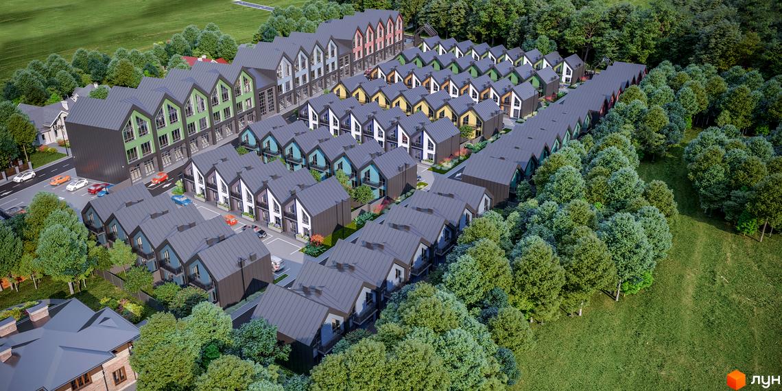 Таунхауси Freya з гостроверхими дахами та різнокольоровими фасадами. Навколишня територія забудови вкрита густими деревами та зеленими газонами.