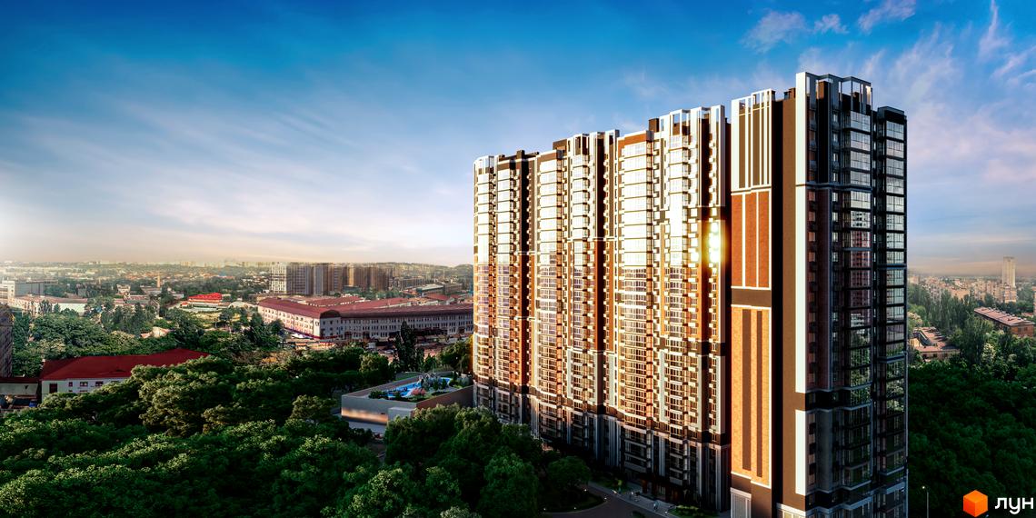 Житловий комплекс Голосіївський - це висотна новобудова з панорамними вікнами та цегляними вставками, оточена зеленою зоною та зоною відпочинку з басейном.