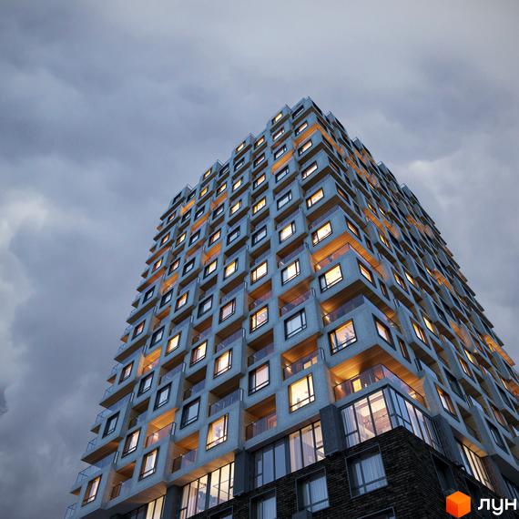 Зовнішній вигляд житлового комплексу Kub29 із численними вікнами та балконами, що виглядає вражаюче на тлі хмарного неба.