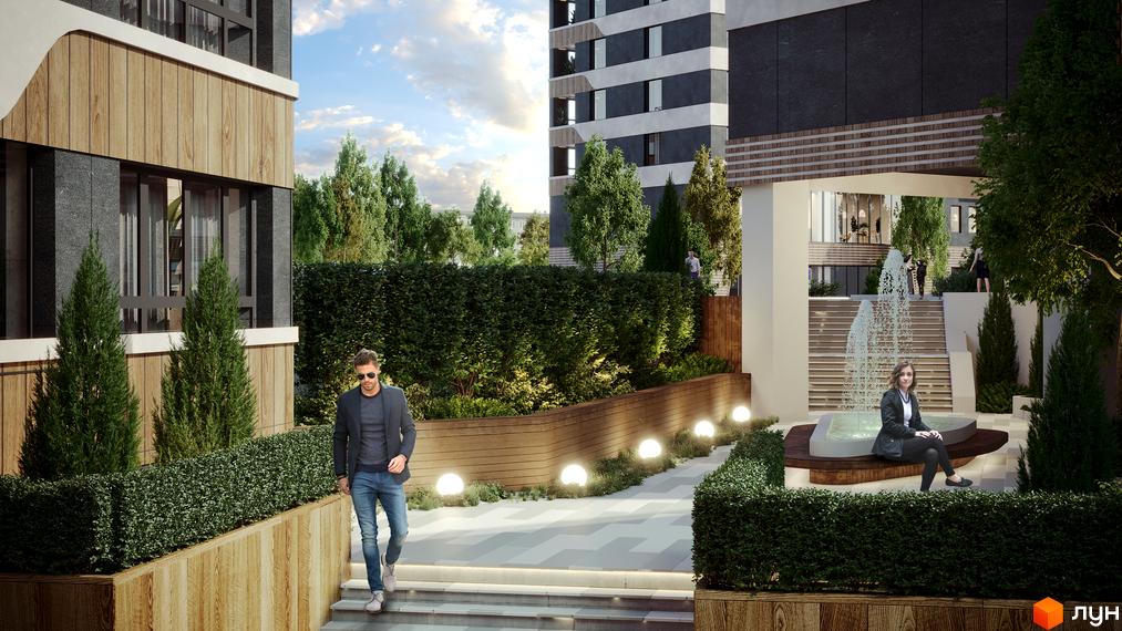 Фасад Житлового комплексу CITÉ з темними панелями та дерев'яними вставками. Озеленена прибудинкова територія з доріжками та фонтаном.