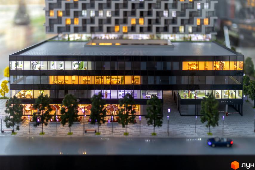 Зображення макету Житлового комплексу BOSTON Creative House з панорамними вікнами та прибудинковою територією.