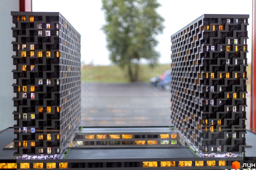 Зображення макету Житлового комплексу BOSTON Creative House з двома висотними будівлями та прибудинковою територією.