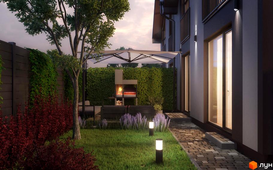 Котеджне містечко КМ KyivOasis. Затишний двір з зоною барбекю, зеленою огорожею та сучасним освітленням.