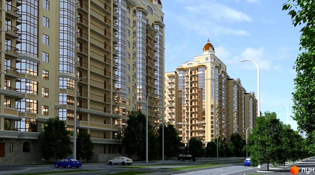 Житловий комплекс Західний складається з високих будівель світлого кольору з великими вікнами та балконами. Перед будинками прокладена дорога з автомобілями, уздовж якої ростуть зелені дерева та стоять ліхтарі.