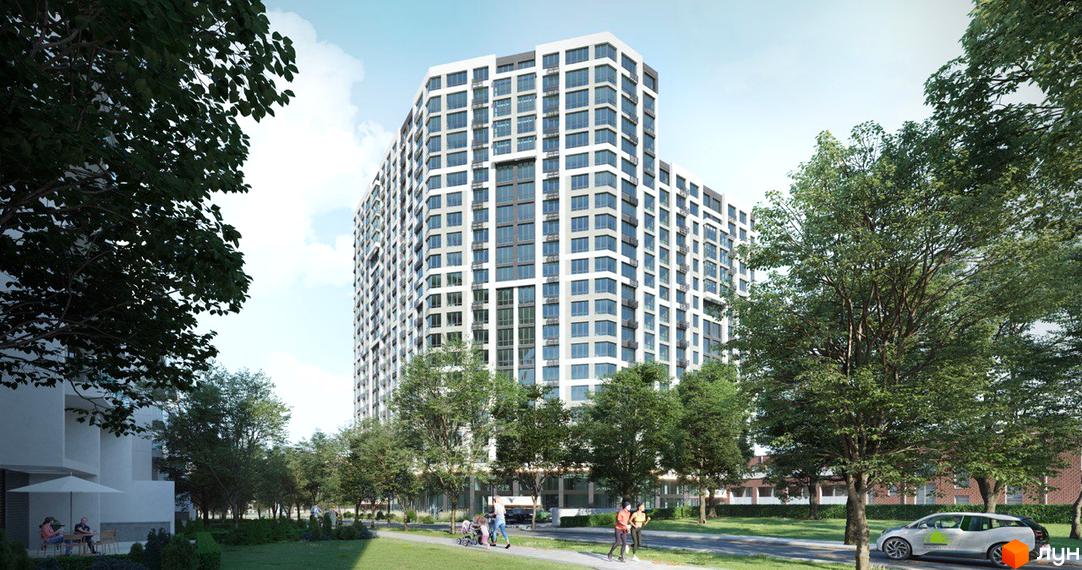 Житловий комплекс Liberty Gardens з білими фасадами та великою кількістю вікон. На прибудинковій території є зелені насадження та місця для відпочинку.