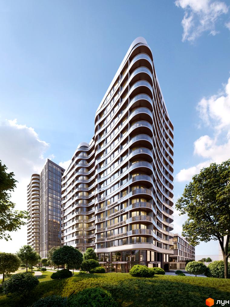 Житловий комплекс Creator City з хвилястими фасадами та скляними балконами на тлі блакитного неба. Навколо комплексу зелена доглянута територія з деревами та кущами.