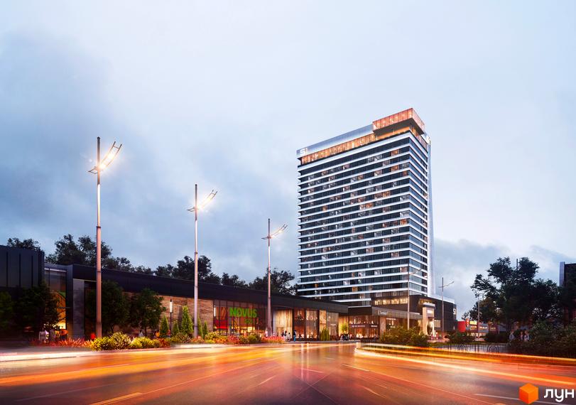 Апарт-комплекс Standard One Terminal з високою вежею та комерційними приміщеннями на першому поверсі. Зовнішній вигляд будівлі та прилегла територія.