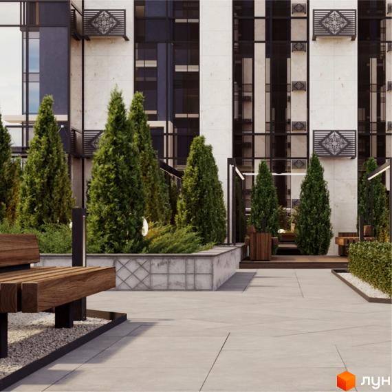 Edelweiss House - новобудова з біло-сірим фасадом та скляними елементами. Прибудинкова територія з ландшафтним дизайном, деревами та місцями для відпочинку.