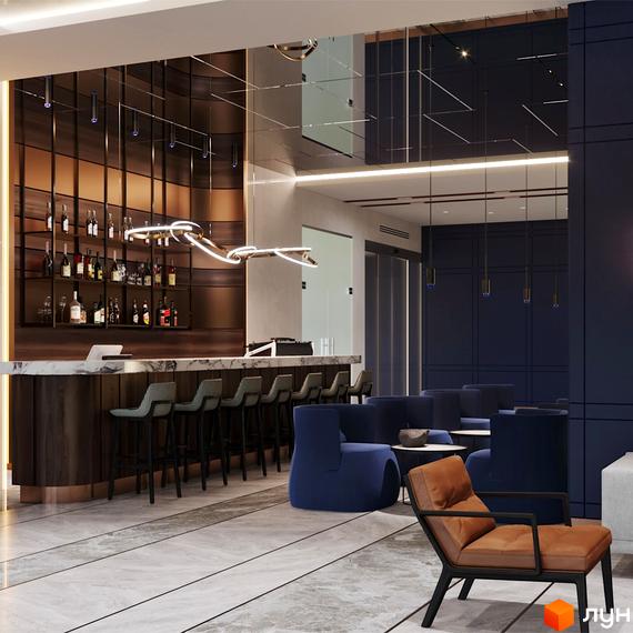 Інтер'єр лобі житлового комплексу Edelweiss House з баром та зонами відпочинку. Сучасний дизайн та зручні меблі для комфортного перебування.