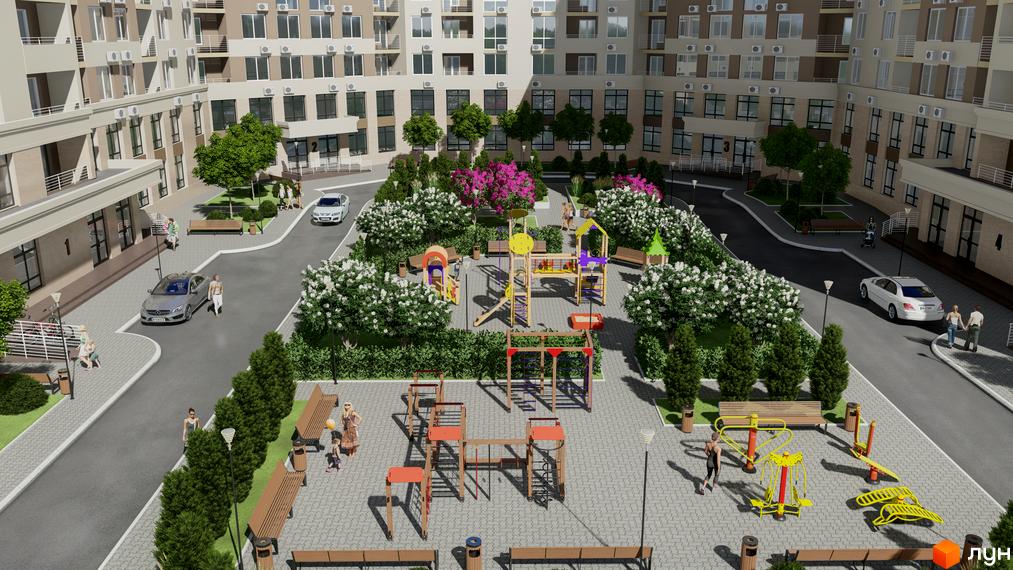 Вигляд на Житловий район Одеські традиції на Глушко. На фото будівля та прибудинкова територія з дитячим майданчиком.