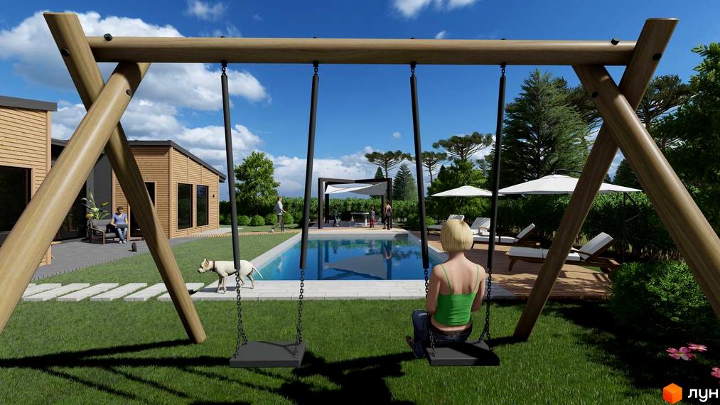 Котеджне містечко КМ BY THE RIVER: дерев'яні будинки з великими вікнами, двір з басейном, шезлонгами та дитячим майданчиком.