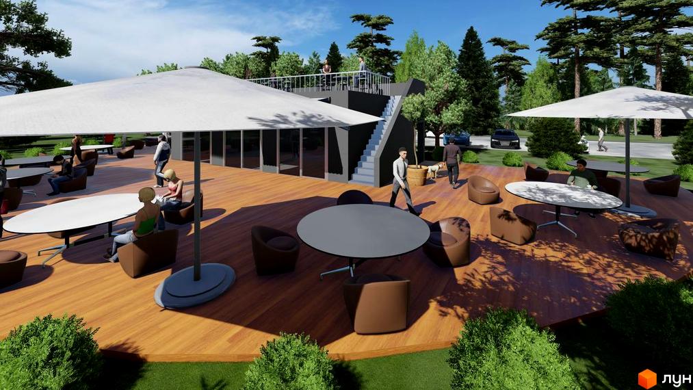 Зовнішній вигляд КМ BY THE RIVER з терасою та зонами відпочинку на дерев'яному настилі. Навколо комплексу розташовані дерева та зелені насадження.