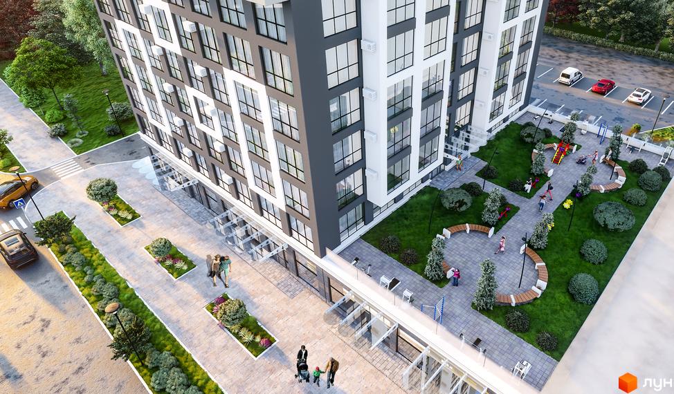 Житловий комплекс Квітень: висотна будівля з сірими та білими фасадами, великими вікнами та доглянутою прибудинковою територією з дитячим майданчиком та зонами відпочинку.