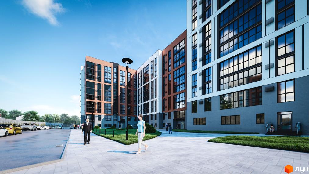 Зовнішній вигляд житлового комплексу Супернова з різнокольоровими фасадами та великими вікнами. Прибудинкова територія з доглянутим газоном, пішохідними доріжками та парковкою.