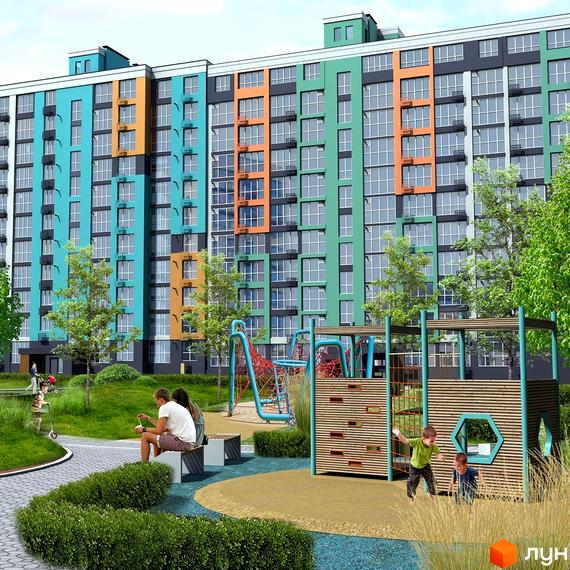 Багатоповерховий будинок Житлового комплексу Олександрівський з кольоровими фасадами. На прибудинковій території дитячий майданчик та зелені насадження.