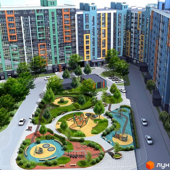 ЖК Олександрівський: багатоповерхові будинки з яскравими фасадами. Двір облаштований великим дитячим майданчиком та зеленими зонами.