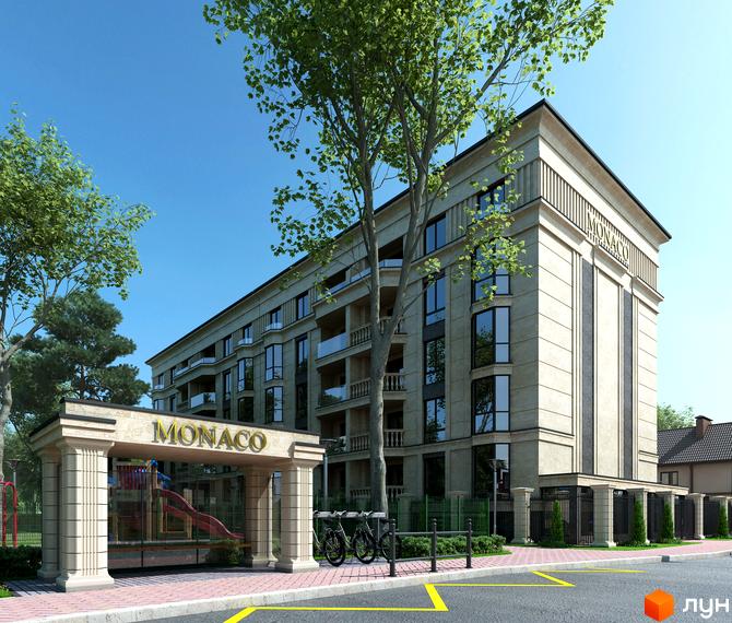 Фасад житлового комплексу Monaco, виконаний у світлих тонах з великими вікнами та балконами. Біля будинку розташований дитячий майданчик та зелені насадження.