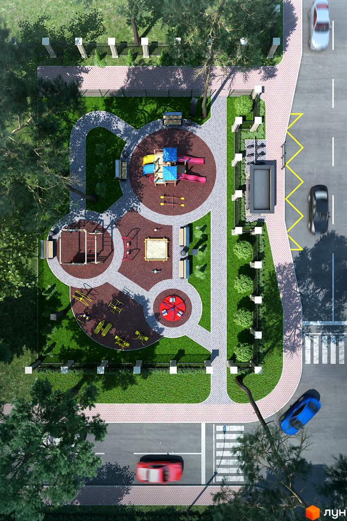 Житловий комплекс Monaco: вид згори на дитячий майданчик з гірками, пісочницею та гойдалками, оточений зеленими зонами та доріжками.