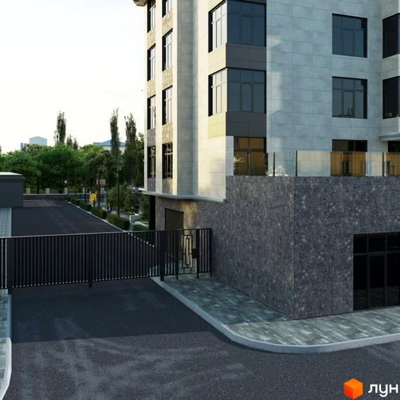 Зовнішній вигляд будинку ЖК Європейський з сірими фасадами та великими вікнами, огороджена територія з воротами та доглянутим подвір'ям.