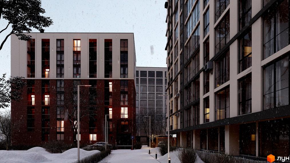 Зображення фасаду та прибудинкової території Житлового комплексу New взимку. Вигляд новобудови та снігового подвір'я.