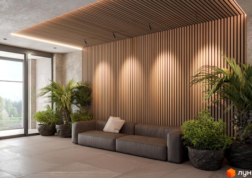 Інтер'єр апартаментів Primorsky Residence: диван, рослини в горщиках, дерев'яна стіна та стеля, великі вікна з видом на природу.