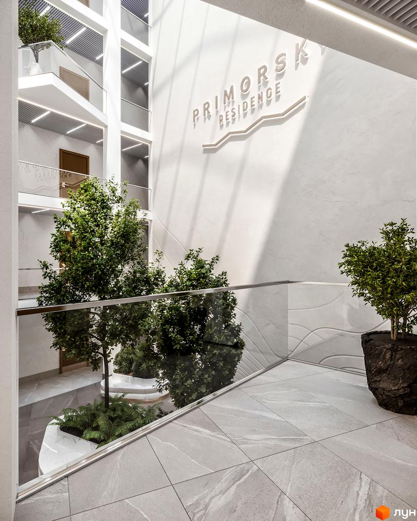 Інтер'єр апарт-комплексу Primorsky Residence з озелененням. Вигляд з балкону на внутрішній двір з деревами та декоративними рослинами.