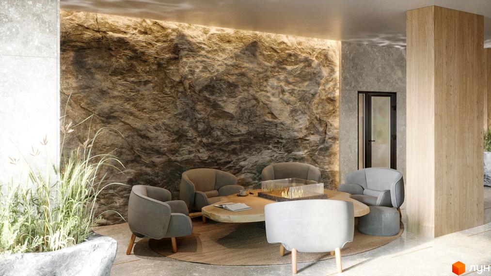 Інтер'єр зони відпочинку в Житловому комплексі Fjord: м'які крісла навколо камінного столу, стіна з імітацією скелі, рослини в камені.