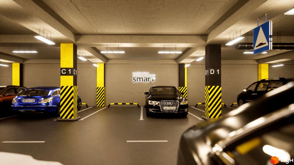 Підземний паркінг у Житловому комплексі Smart з автомобілями. Колони пофарбовані в жовтий колір з чорними смугами.