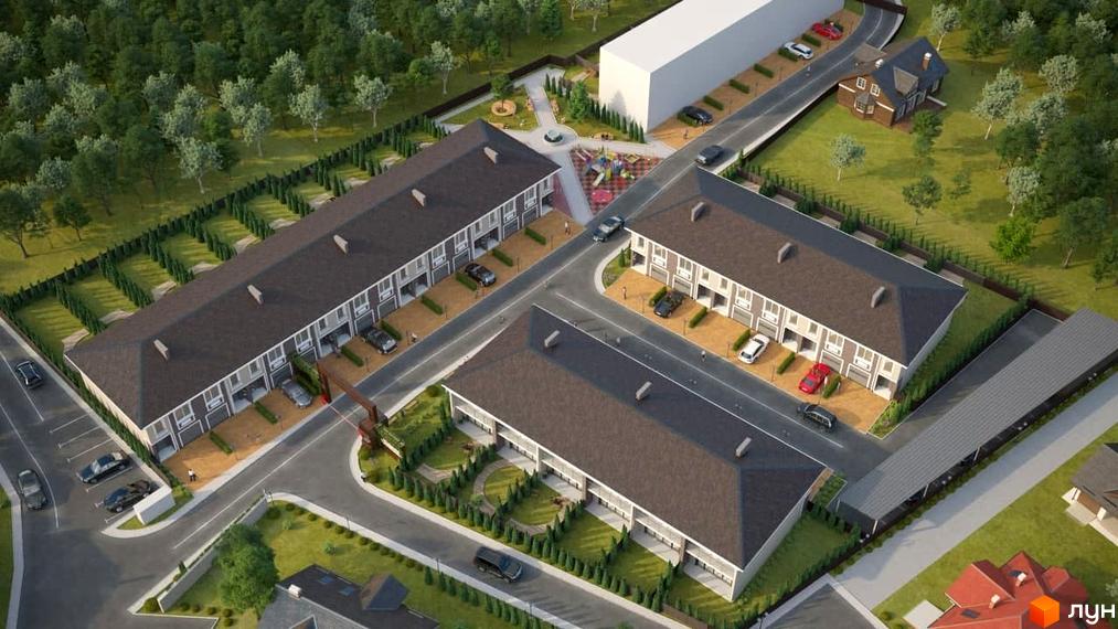 Вигляд зверху на таунхауси Vishenki Townhouse з темними дахами та світлими фасадами. Навколо зелені насадження та дороги.