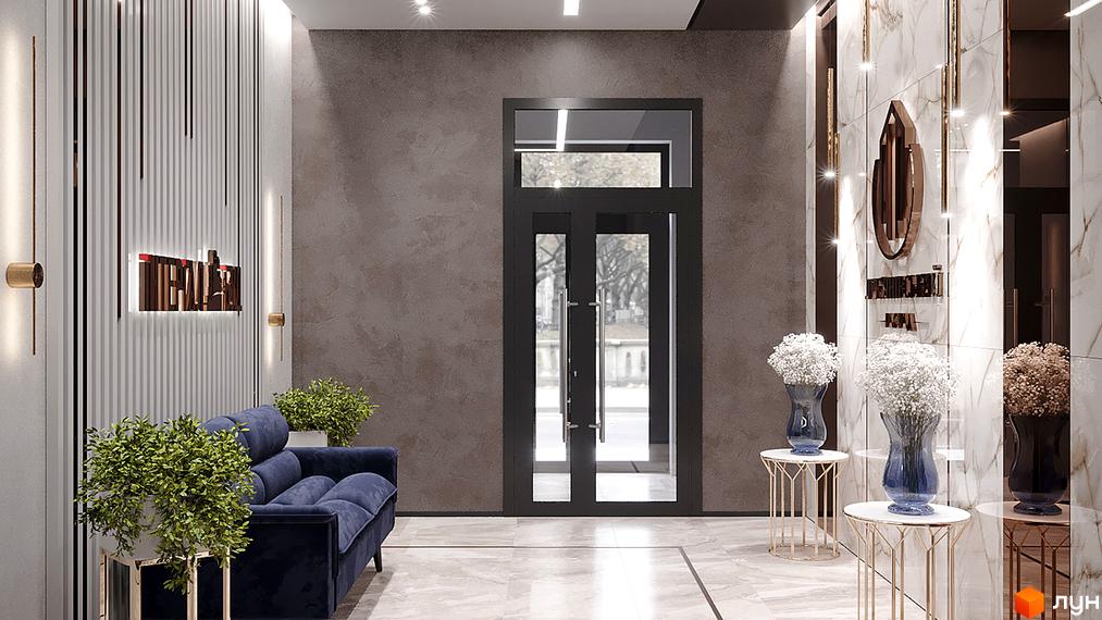 Інтер'єр холу в ЖК Лук'янівський каскад. Простір з диваном, рослинами та декоративними елементами. Двері з скляними вставками.
