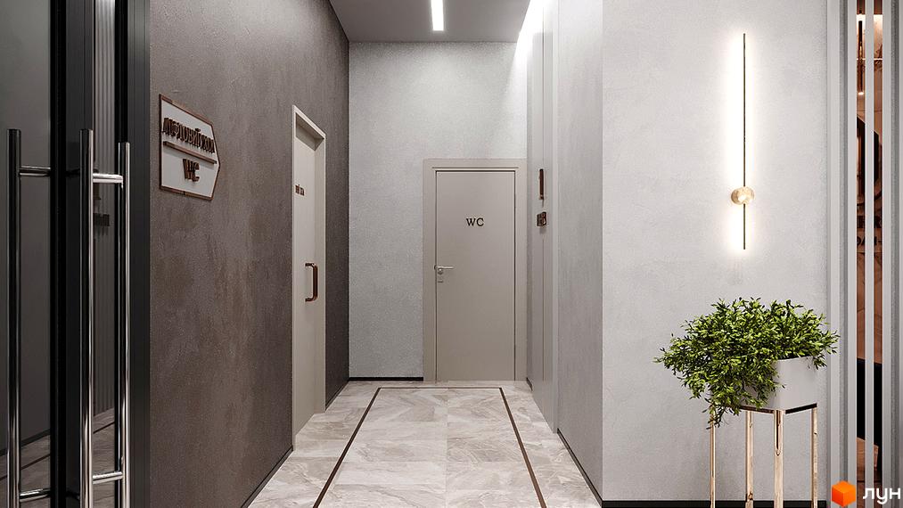 Коридор у ЖК Лук'янівський каскад з дверима, стінами сірого кольору та рослинами. На стіні висить покажчик WC.