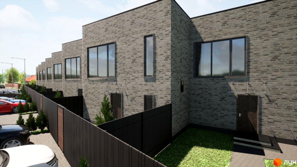 Сірі будинки з цегли в житловому комплексі Grey House. Перед будинками парковка та чорний паркан.