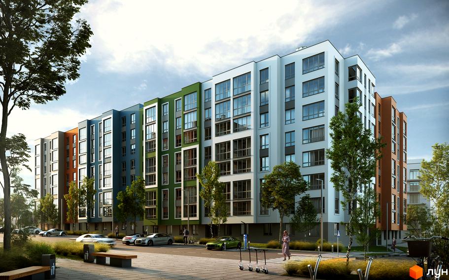 Багатоповерховий будинок з кольоровими фасадами. На прибудинковій території є дерева, тротуар та парковка для автомобілів.