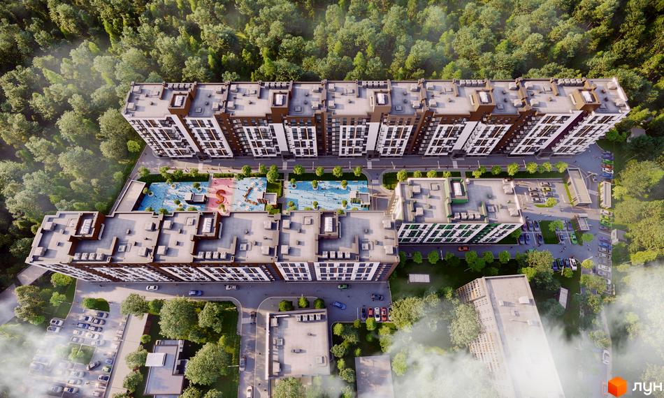 Житловий комплекс Forest Home з висоти пташиного польоту, що демонструє багаторівневі будівлі та зелену прибудинкову територію з дитячими майданчиками.