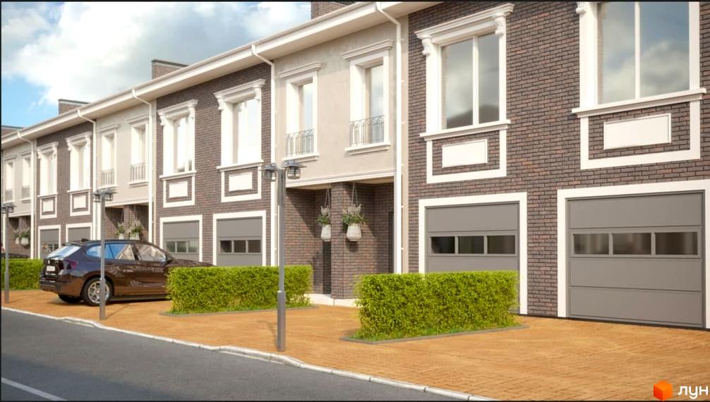 Фасад таунхаусів Vishenki Townhouse з цегли з великими вікнами та гаражами. Перед будинками зелені насадження та дорога.