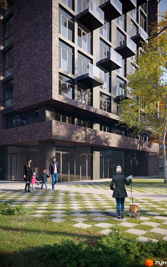 Житловий комплекс MAISON з фасадом з цегли. На прибудинковій території газон з декоративним покриттям та зелені насадження.